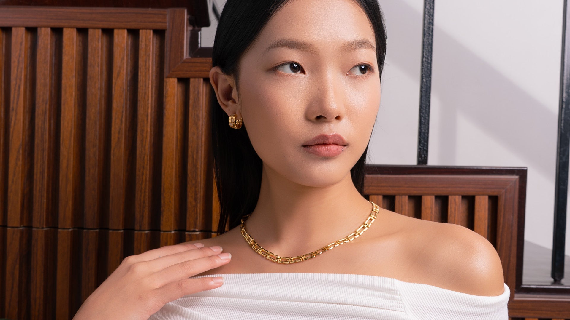 LAVANA demi-fine jewellery collection showcasing elegant rings, necklaces, and bracelets in a stylish lifestyle shot