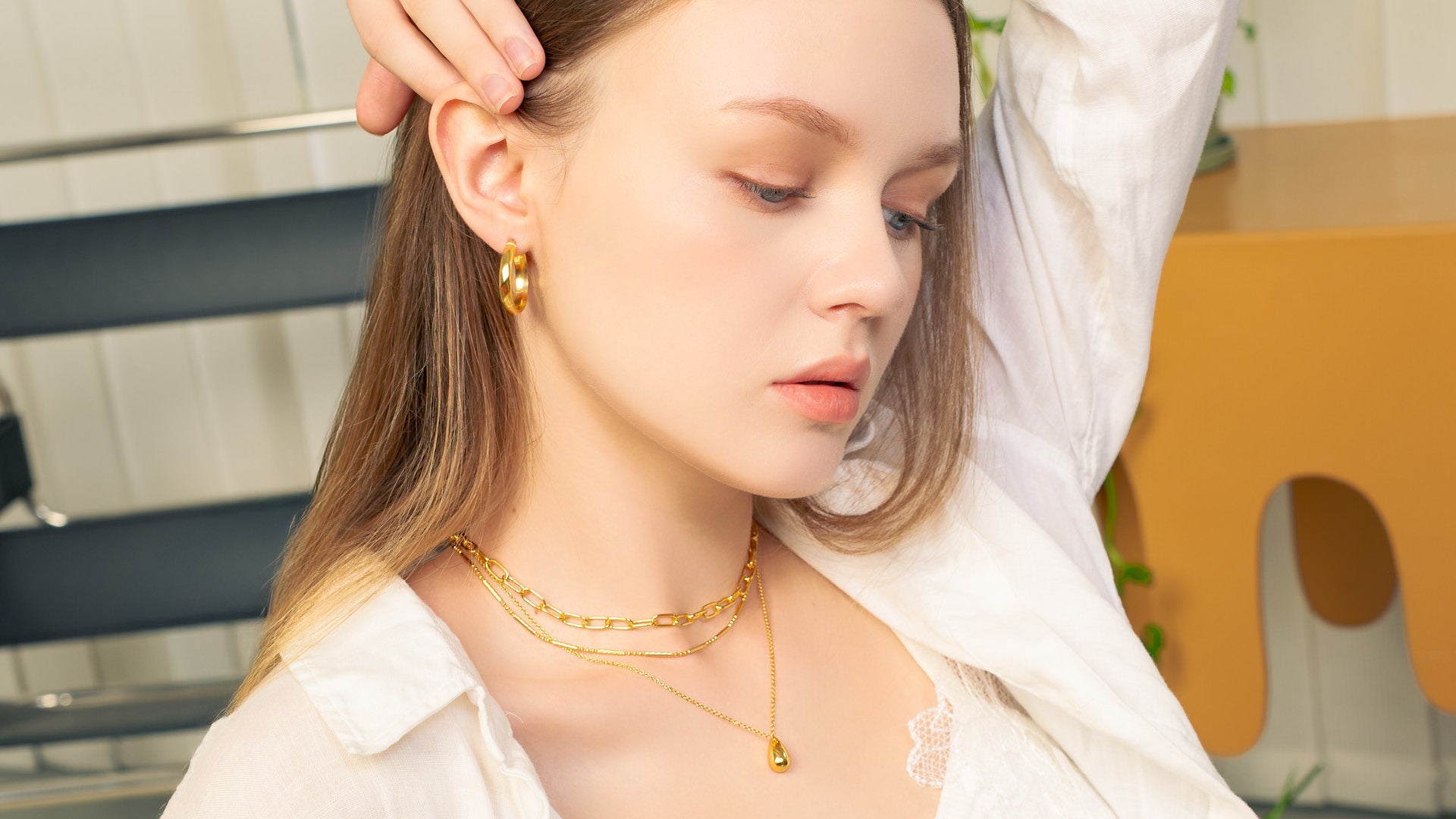 LAVANA elegant gold and silver earrings lifestyle shot showcasing stylish jewellery collection