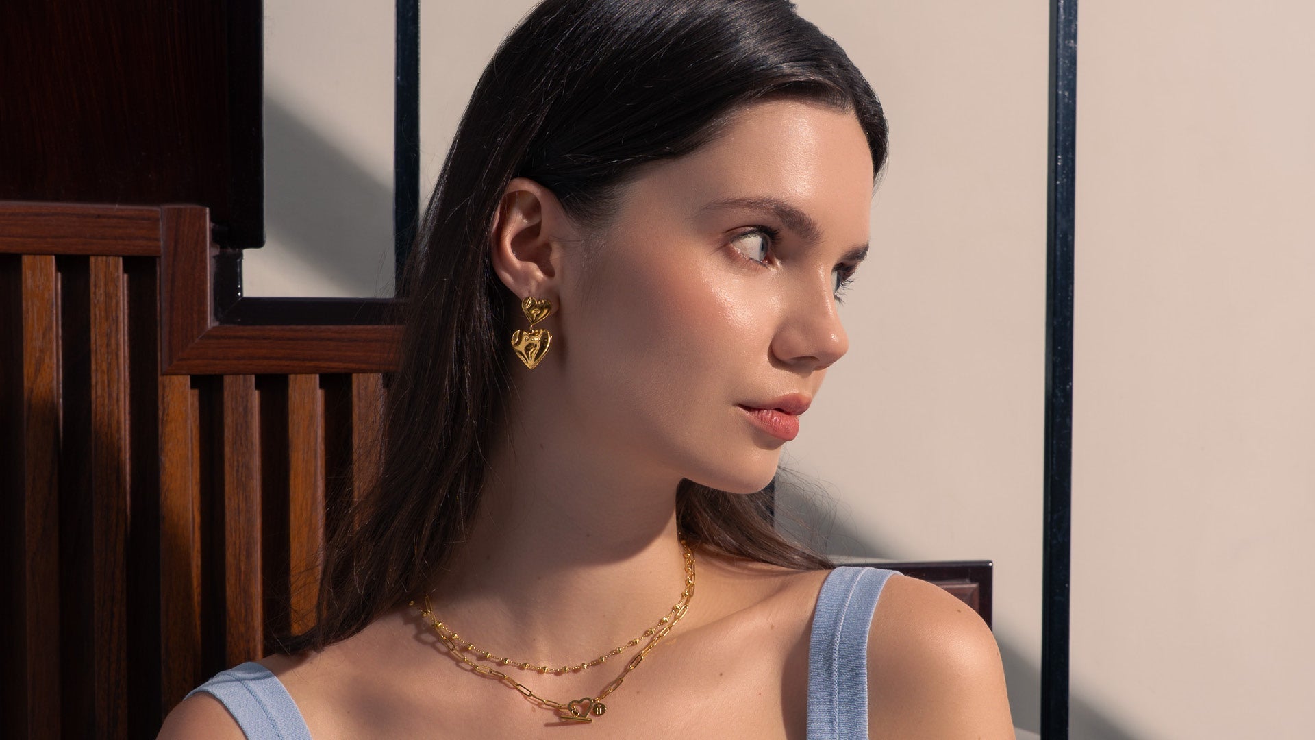LAVANA heart earrings lifestyle shot featuring elegant gold jewellery for romantic style