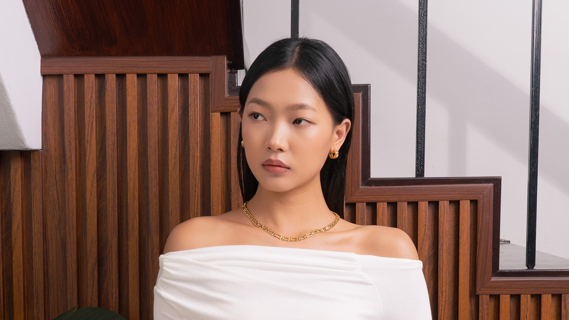LAVANA huggie earrings collection showcasing elegant gold and silver designs on white background