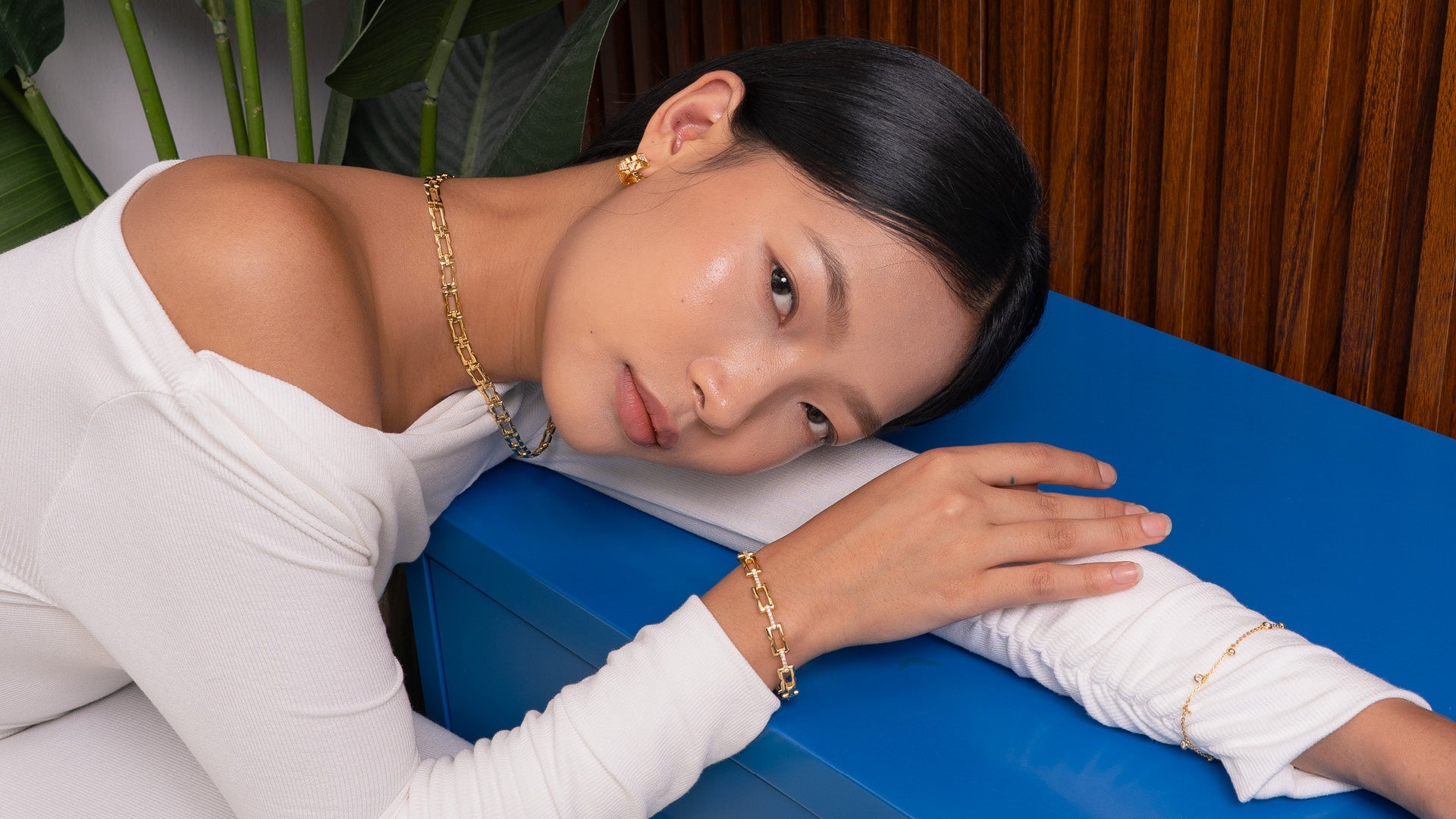 LAVANA Signature Necklaces lifestyle shot showcasing layered gold and silver pendant necklaces