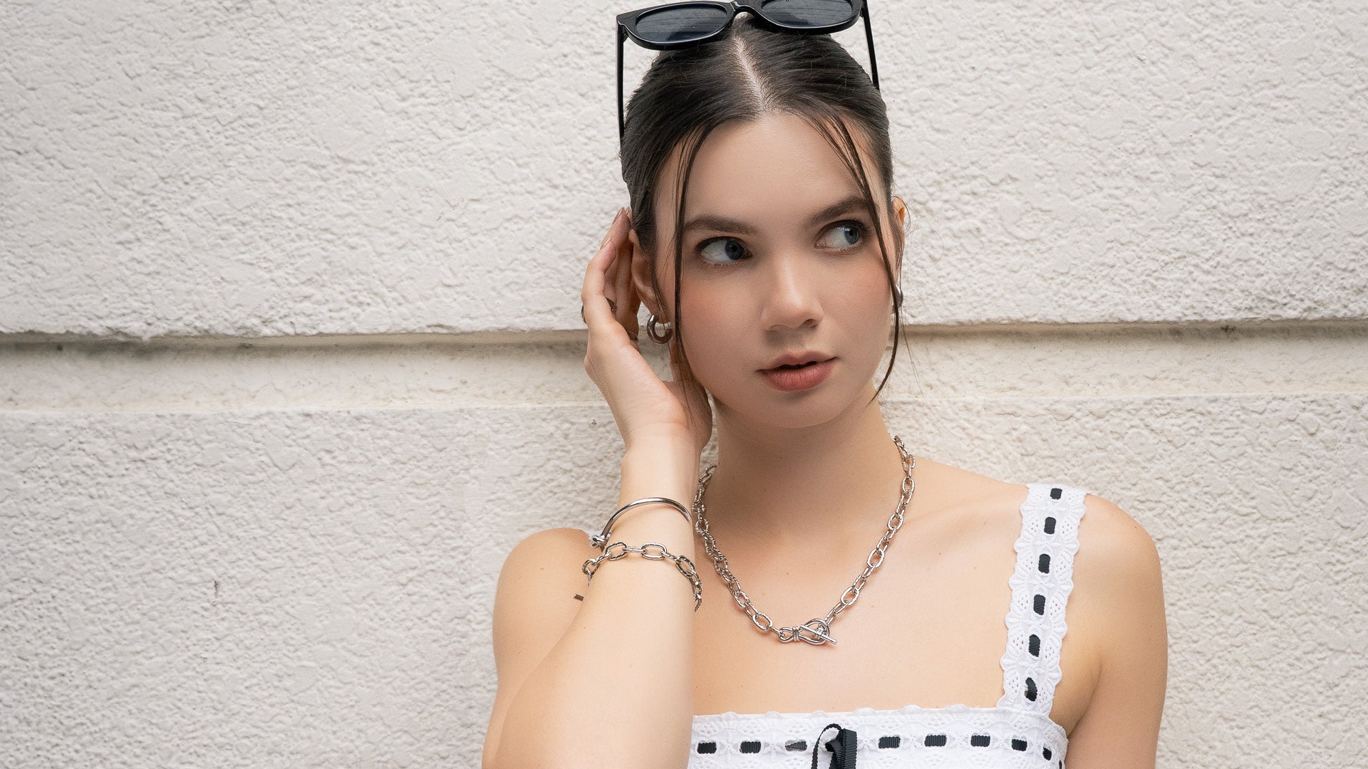 LAVANA elegant silver bracelets styled on wrist in lifestyle shot for silver bracelets collection page