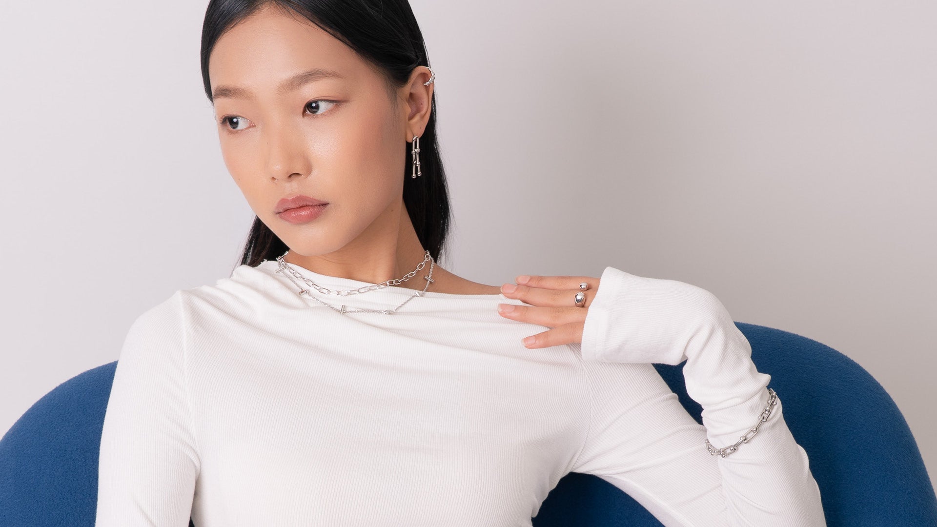 LAVANA sterling silver jewellery collection showcasing elegant rings, necklaces, and bracelets in a lifestyle setting