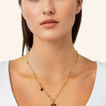 Aquarius Gold Zodiac Tag Necklace by Lavana, on model engraved tag on beaded chain, back