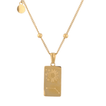 Aries Gold Zodiac Tag Necklace by Lavana, engraved tag front and back on beaded station chain, back view