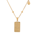 Aries Gold Zodiac Tag Necklace by Lavana, engraved tag front and back on beaded station chain, front view