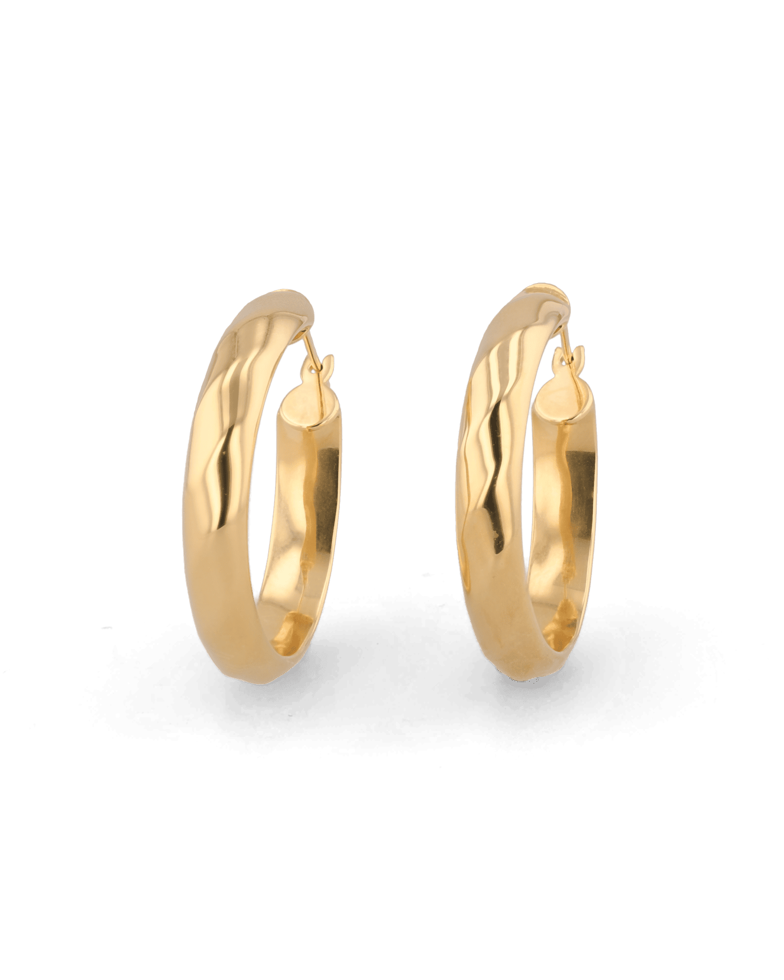 Aura Gold Hoop Earrings by Lavana, wide medium hoops with angled light catching detail