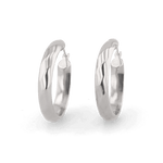 Aura Silver Hoop Earrings by Lavana, medium width hoops with angled light catching detail