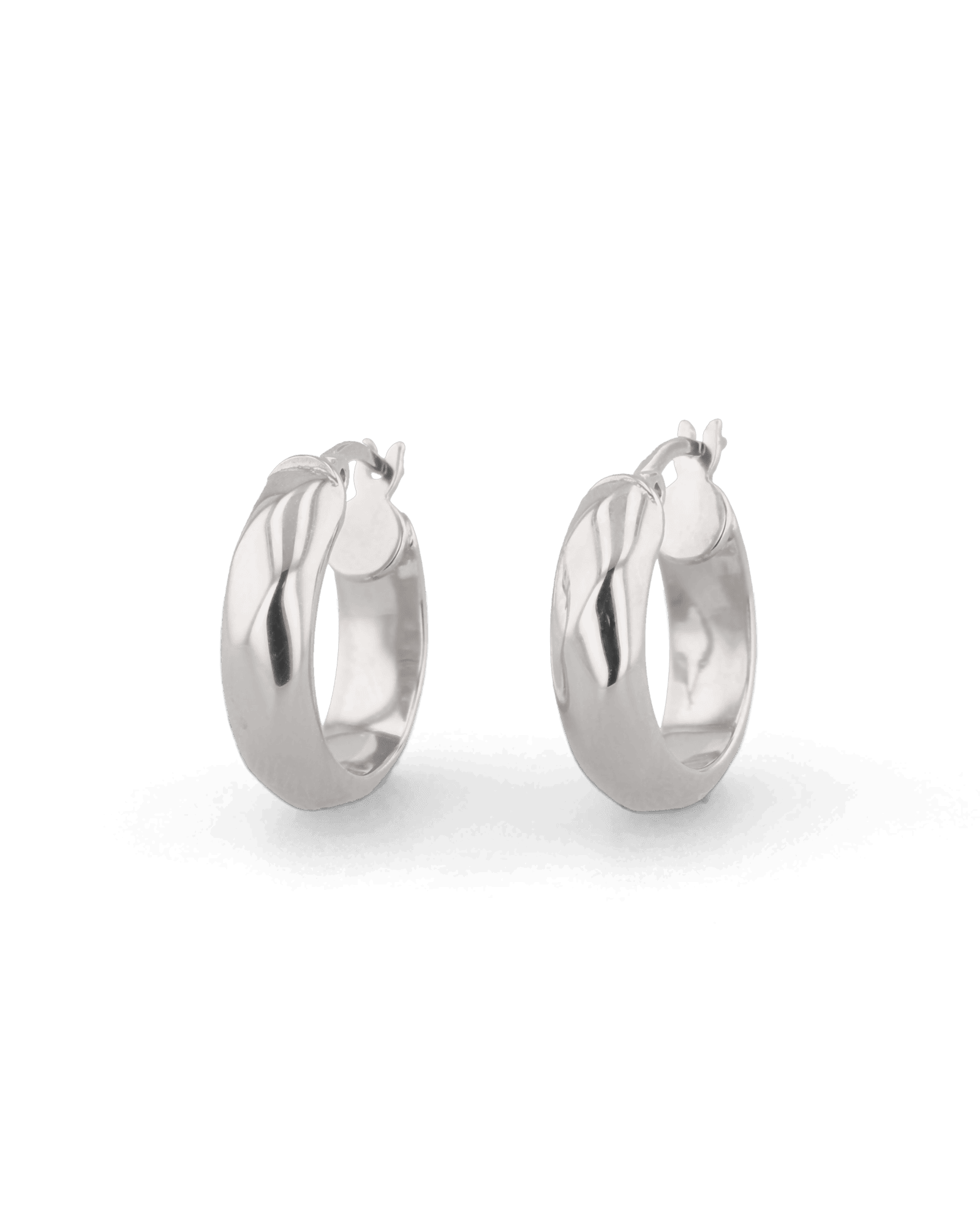 Aura Silver Hoop Earrings by Lavana, medium width hoops with angled light catching detail