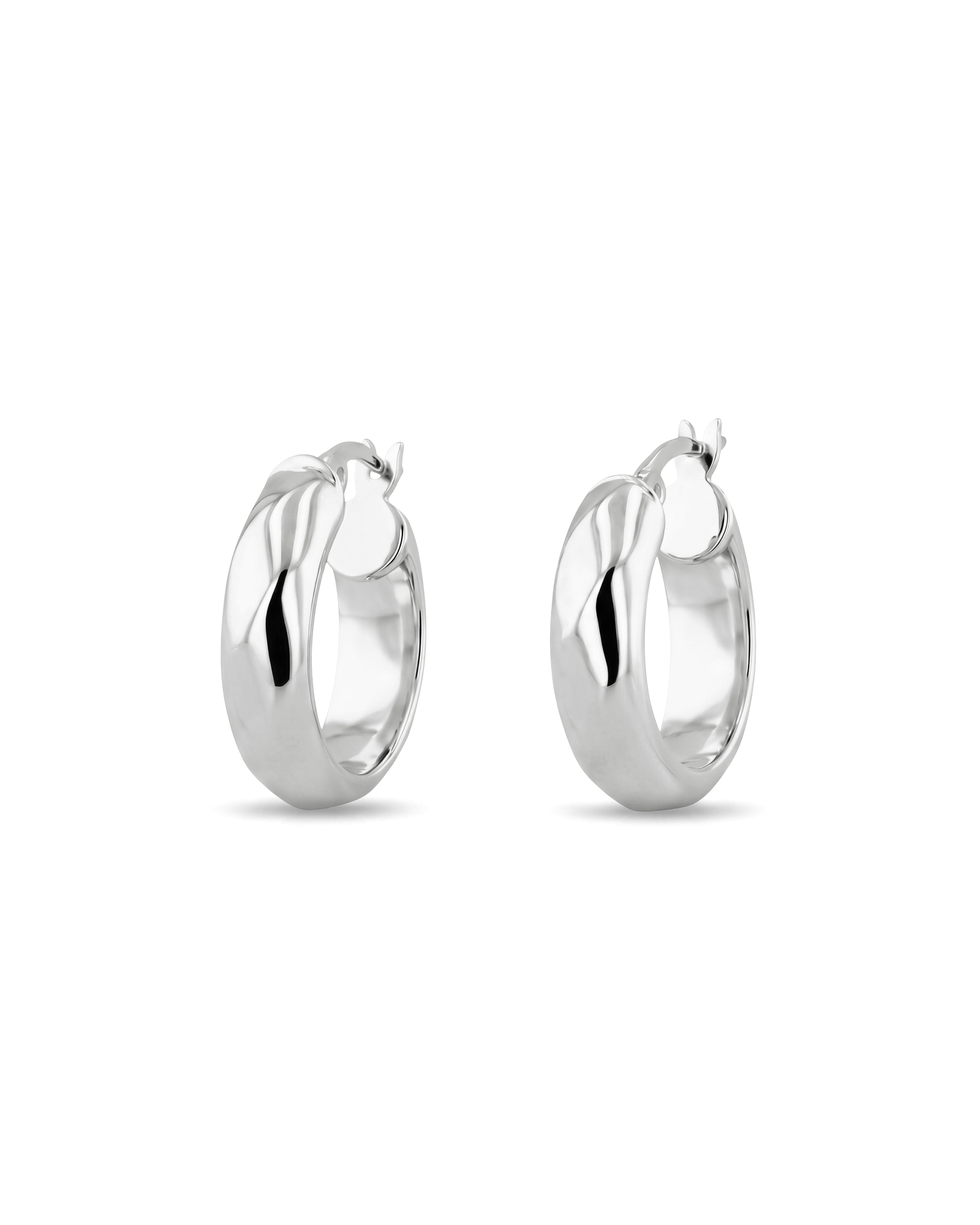 Aura Silver Hoop Earrings by Lavana, medium width hoops with angled light catching detail