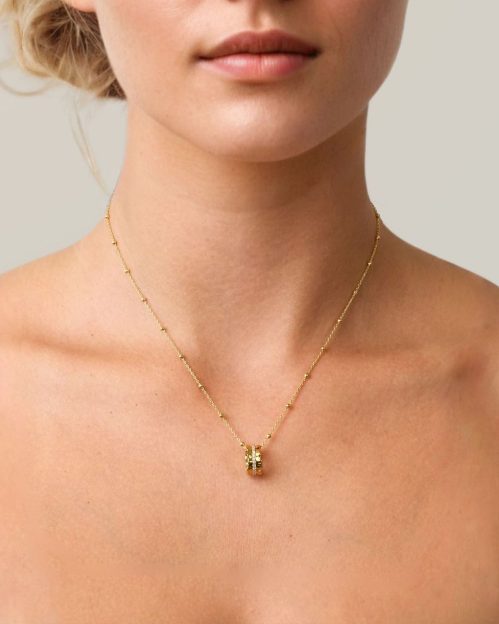 Aurora Gold Diamond Pendant by LAVANA on model sculptural ripple pendant with lab grown diamonds