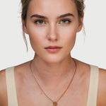 Aurora Gold Diamond Pendant by Lavana on model sculptural ripple pendant with lab-grown diamonds