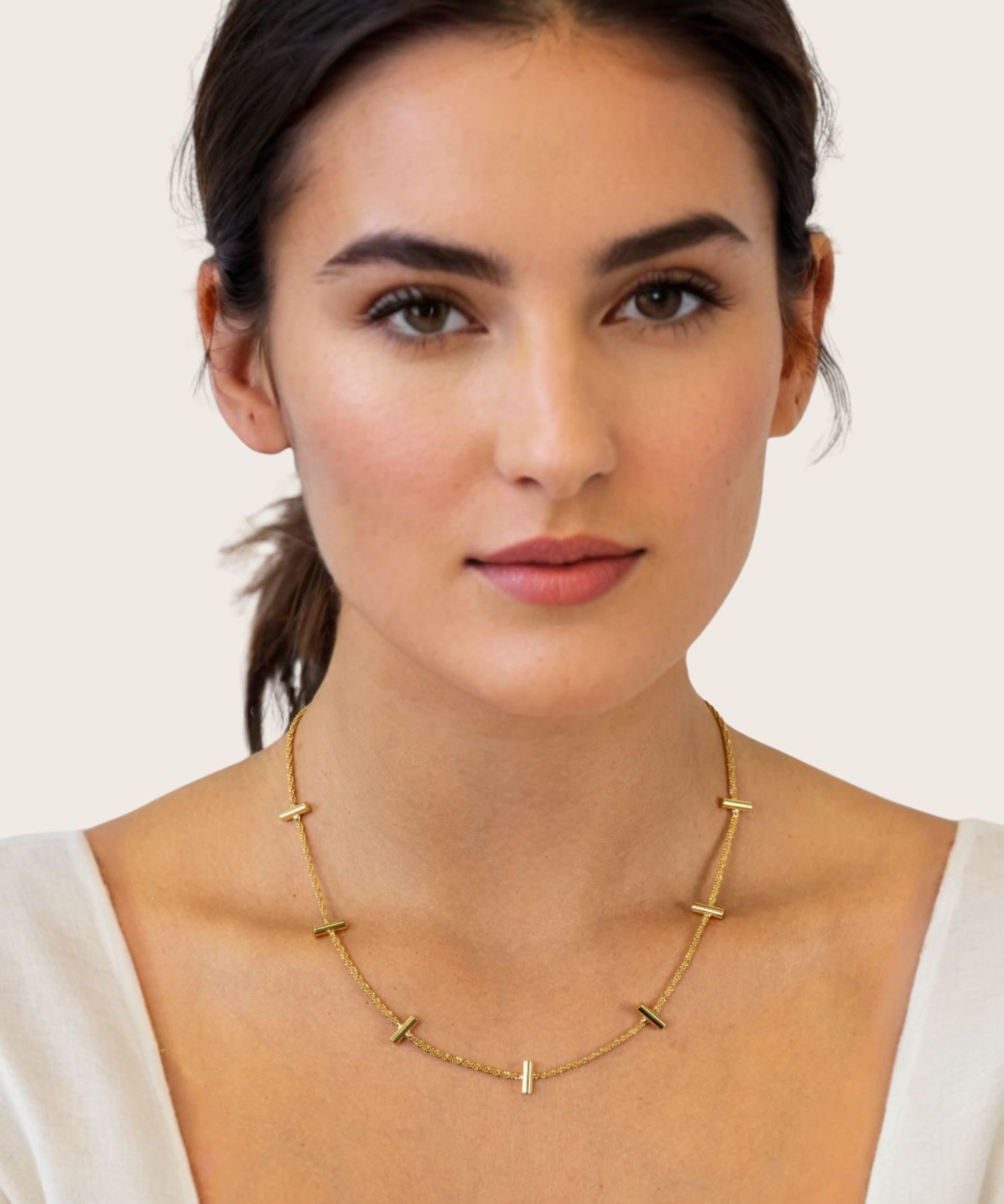 Axis Bar Gold Chain Necklace by Lavana, on model fine chain with evenly spaced bar stations