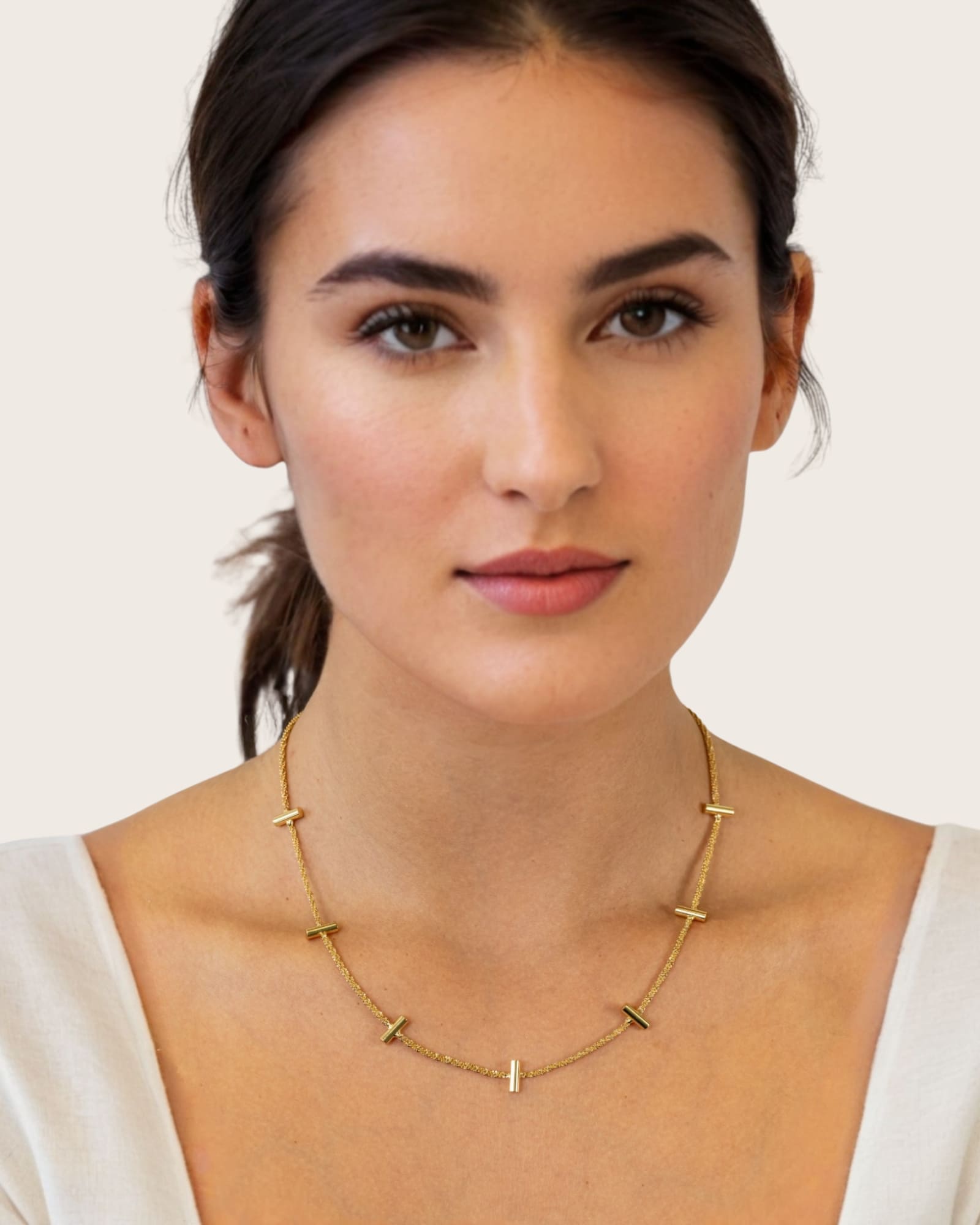 Axis Bar Gold Chain Necklace by Lavana, on model fine chain with evenly spaced bar stations