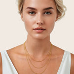 Baby Belcher Gold Chain Necklace by Lavana, on model; layered with fine rounded belcher links