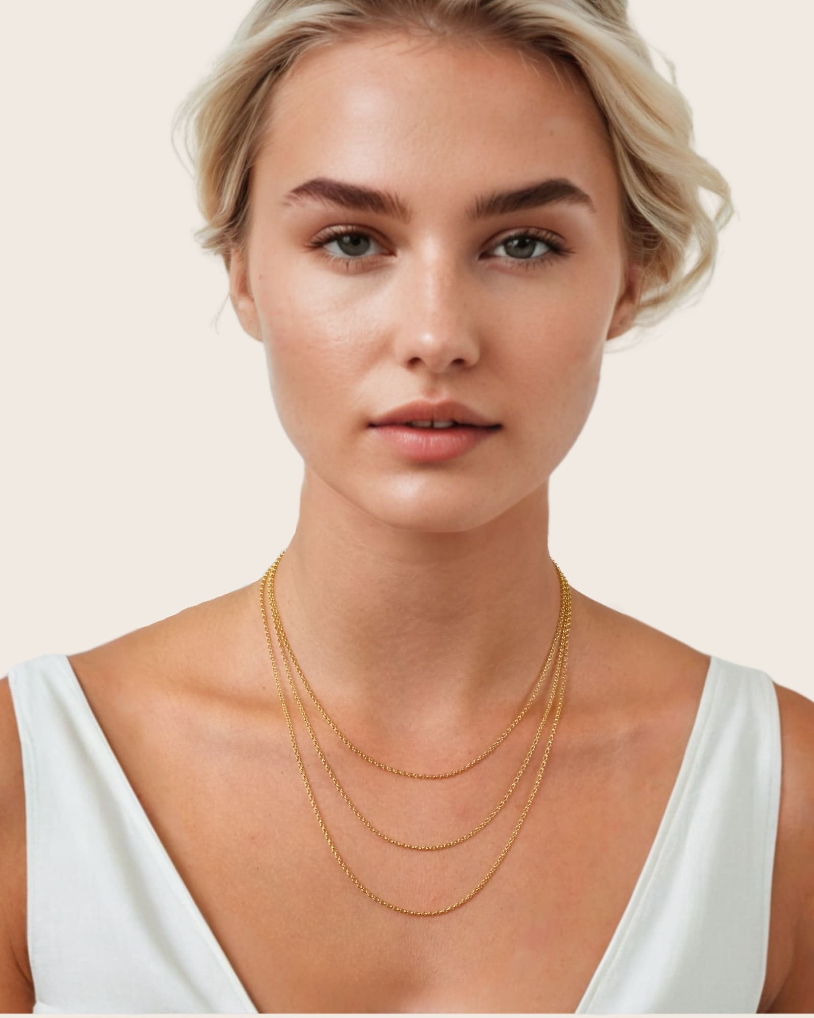 Baby Belcher Gold Chain Necklace by Lavana, on model; layered with fine rounded belcher links