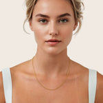 Baby Belcher Gold Chain Necklace by Lavana, on model; medium with fine rounded belcher links