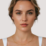 Baby Belcher Gold Chain Necklace by Lavana on model with fine rounded belcher links