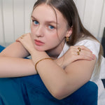 Bamboo Gold Cuff Bracelet by Lavana, on model with polished bamboo texture on an open classic cuff