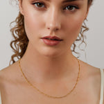 Brooklyn Gold Station Chain Necklace by Lavana on model curb chain with polished bead stations