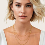 Brooklyn Gold Station Chain Necklace by Lavana, on model; layered curb chain with polished bead stations