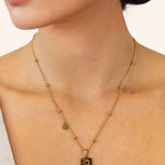 Cancer Gold Zodiac Tag Necklace by Lavana, on model engraved tag with constellation on beaded chain, back