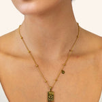 Cancer Gold Zodiac Tag Necklace by Lavana, on model engraved tag with constellation on beaded front