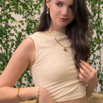 Capri Gold Pearl Necklace by Lavana on model; half modern paperclip chain half freshwater pearls with coin charm