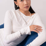Capri Silver Pearl Necklace by Lavana, on model; modern half paperclip chain half freshwater pearls with coin