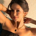 Cascade Gold Hoop Earrings by LAVANA, on model; overlapping arc design with polished finish dress hoops