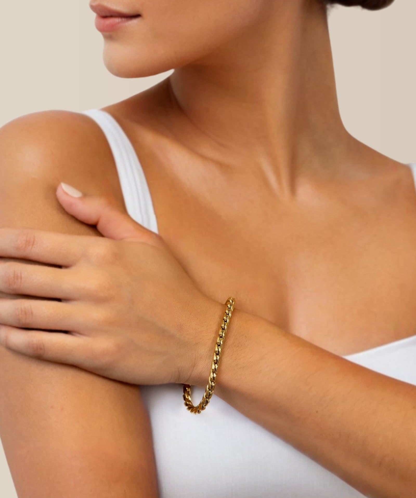 Core Gold Chain Bracelet by Lavana on model with sleek cord style links