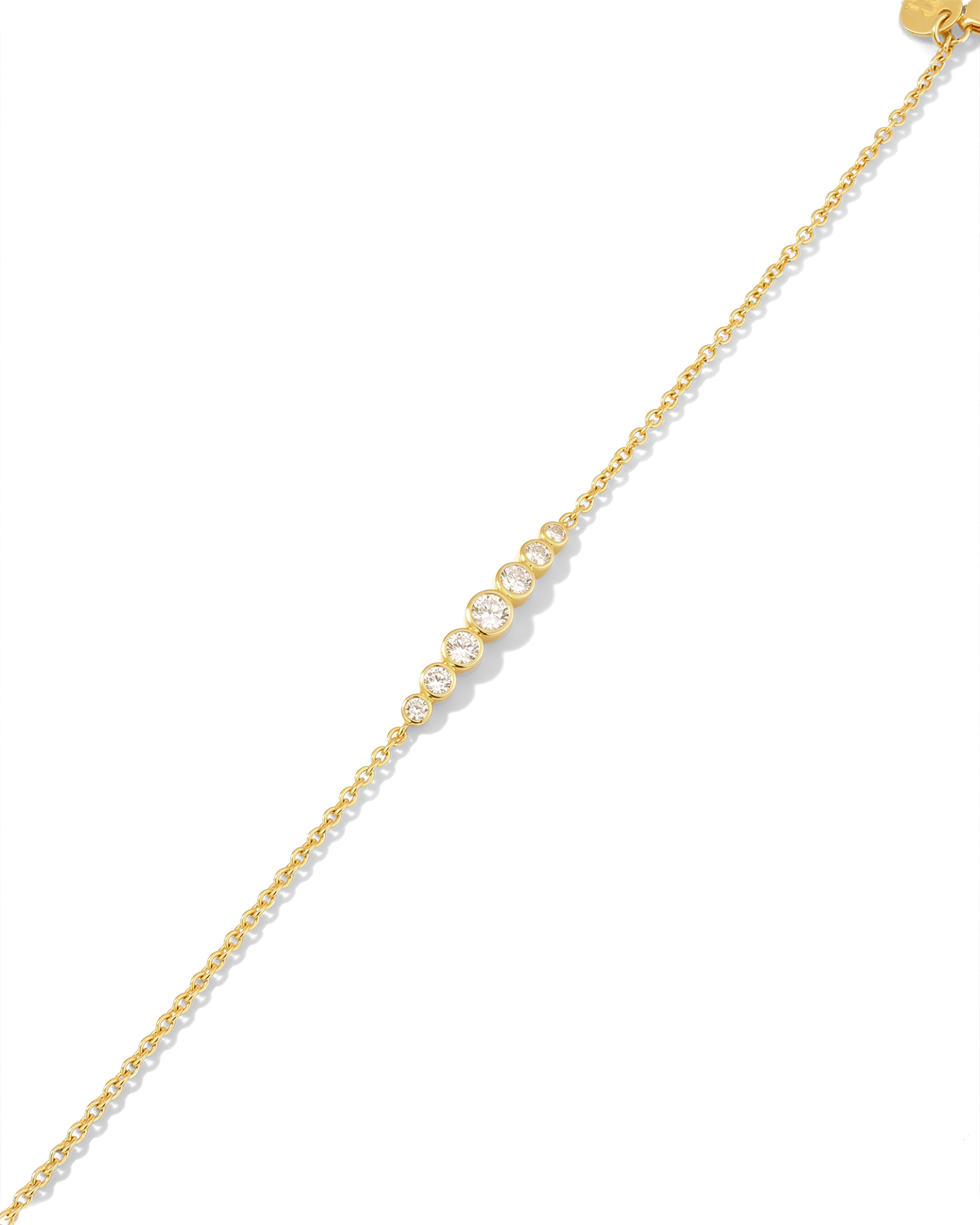 Crescendo gold diamond bracelet by Lavana, with graduating bezel set lab grown diamonds and slider adjuster