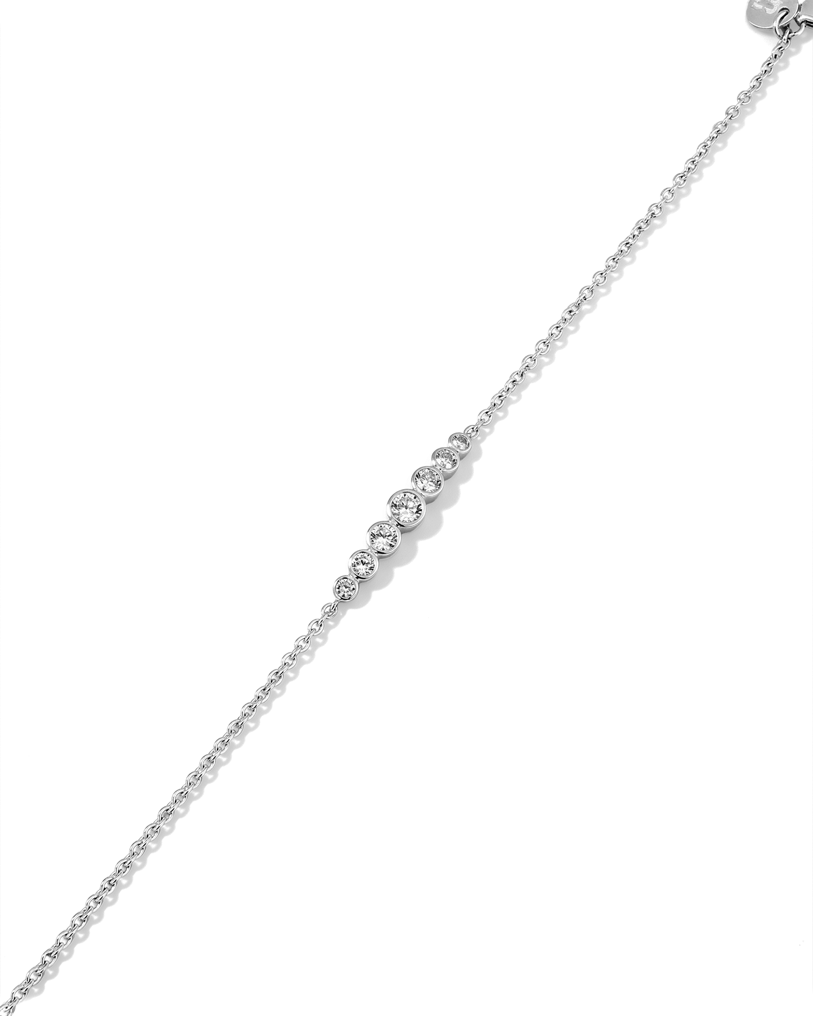 Crescendo silver diamond bracelet by Lavana with graduating bezel set lab grown diamonds and slider adjuster 2