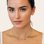 Dancing Discs Gold Chain Necklace by Lavana, fine chain with scattered polished discs