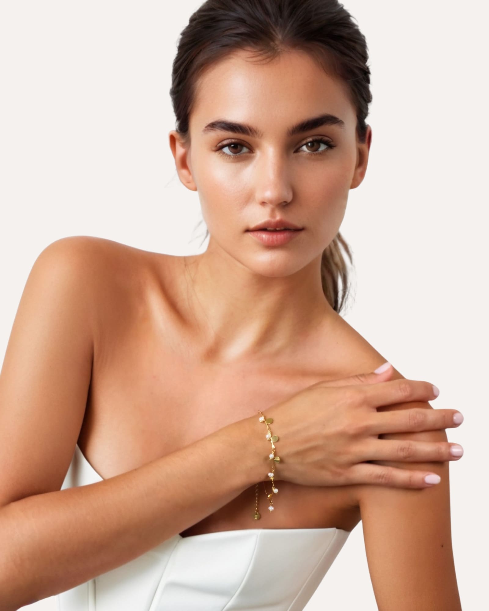 Dancing Discs Tango Gold Bracelet by Lavana, on model; chain bracelet with discs and freshwater pearl charms