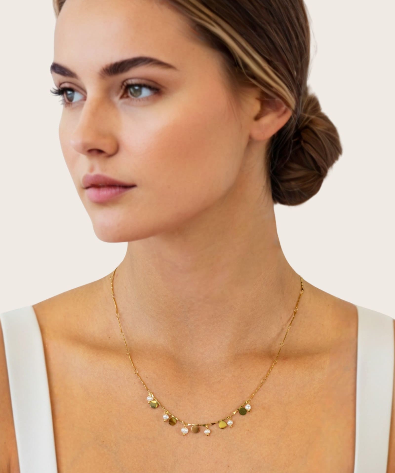 Dancing Discs Tango Gold Chain Necklace by Lavana, on model; chain with alternating discs and freshwater pearls