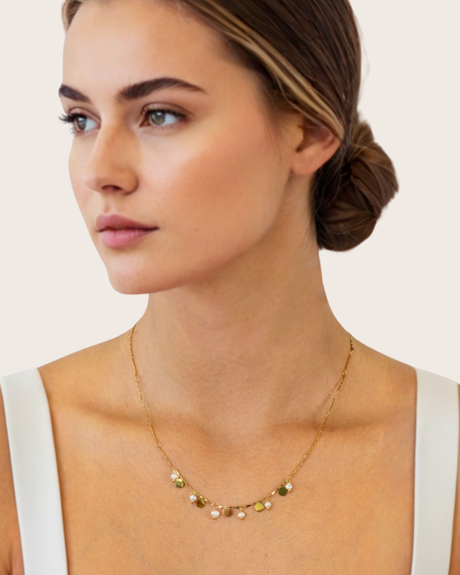 Dancing Discs Tango Gold Chain Necklace by Lavana, on model; chain with alternating discs and freshwater pearls