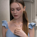 Dancing Discs Tango Gold Chain Necklace by Lavana, on model; chain with classic alternating discs and freshwater pearls 