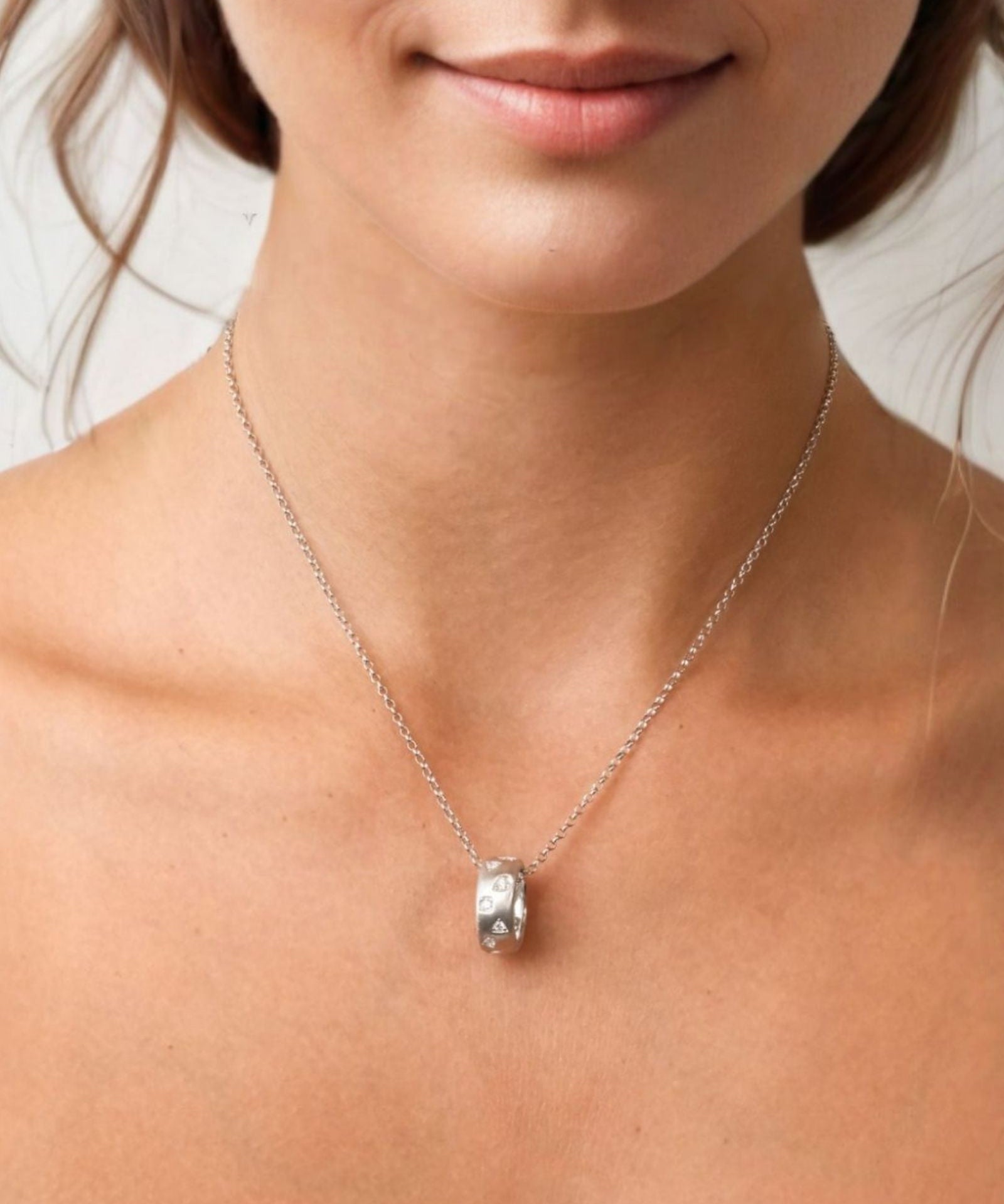 Dancing Stars Silver Pendant by LAVANA on model with lab grown diamond accents
