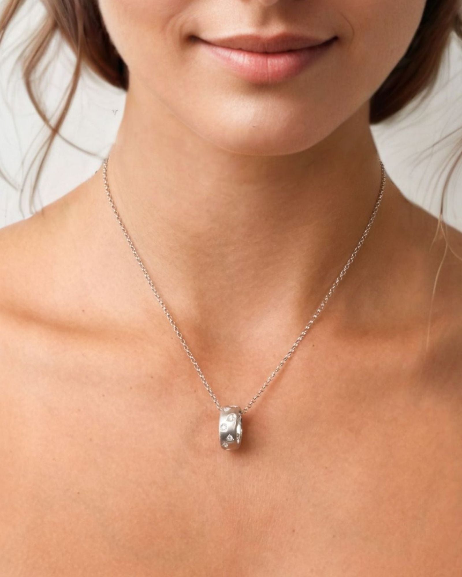 Dancing Stars Silver Pendant by LAVANA on model with lab grown diamond accents