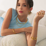 Disco Mesh Gold Bracelet by Lavana, on model twist mesh surface polished finish Melt gold open ring