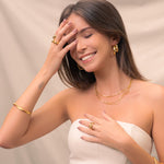 Disco Mesh Gold Cuff Bracelet by Lavana, on model; modern Twisty mesh surface with polished finish