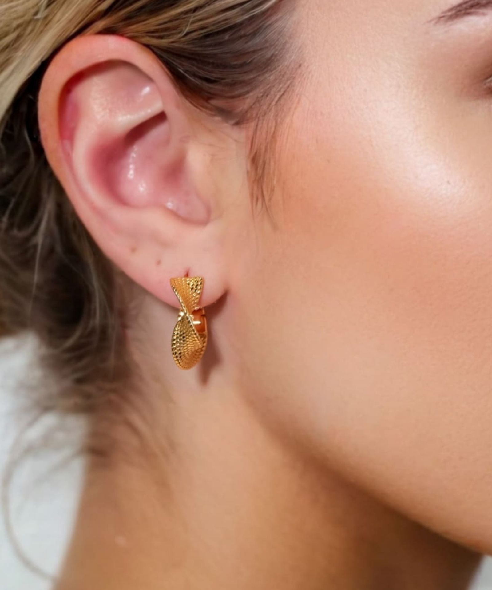 Disco Mesh Gold Hoop Earrings by Lavana on model twisty mesh texture with polished shine