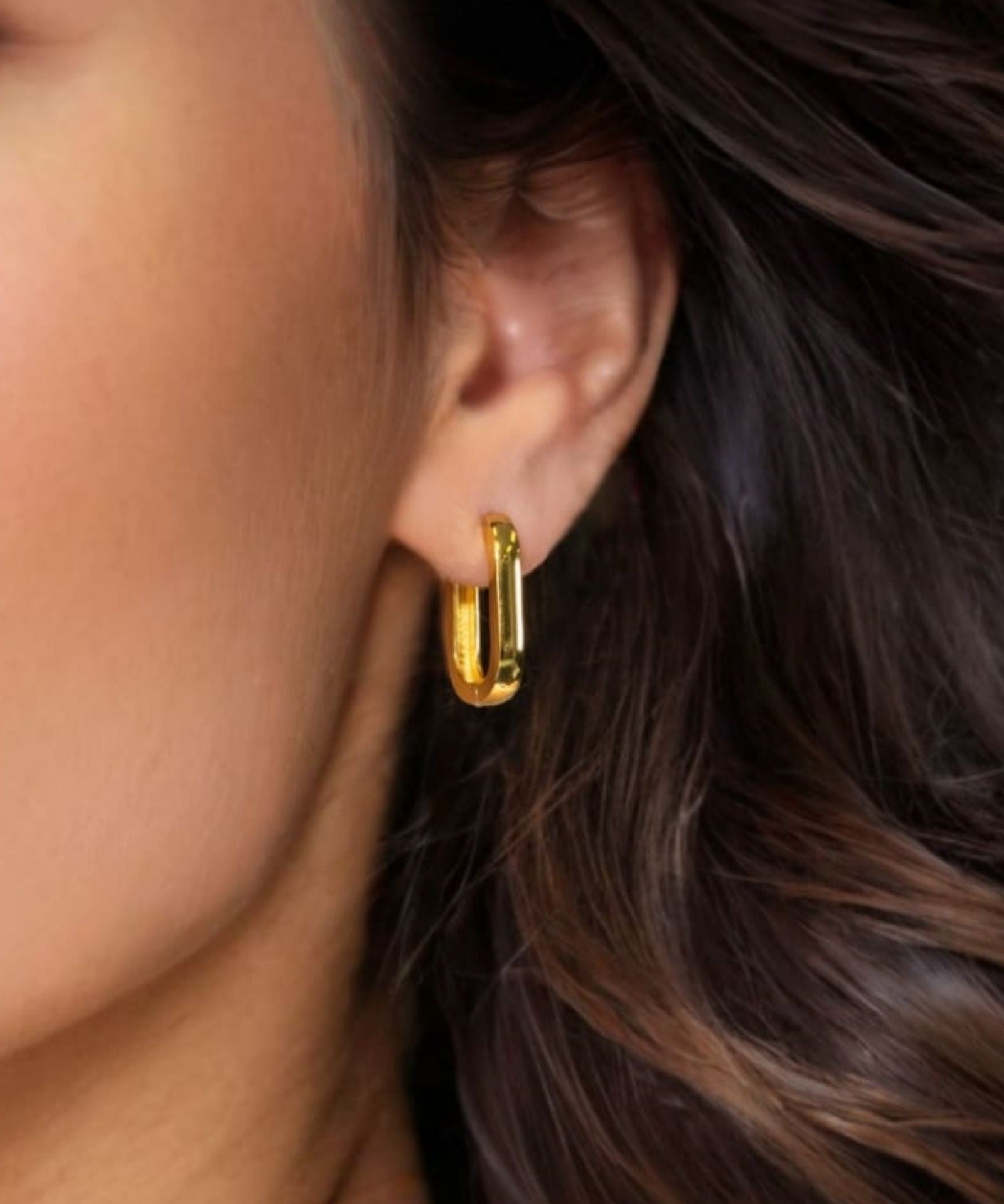 Ellipse Gold Hoop Earrings by Lavana on model slim oblong hinged hoops