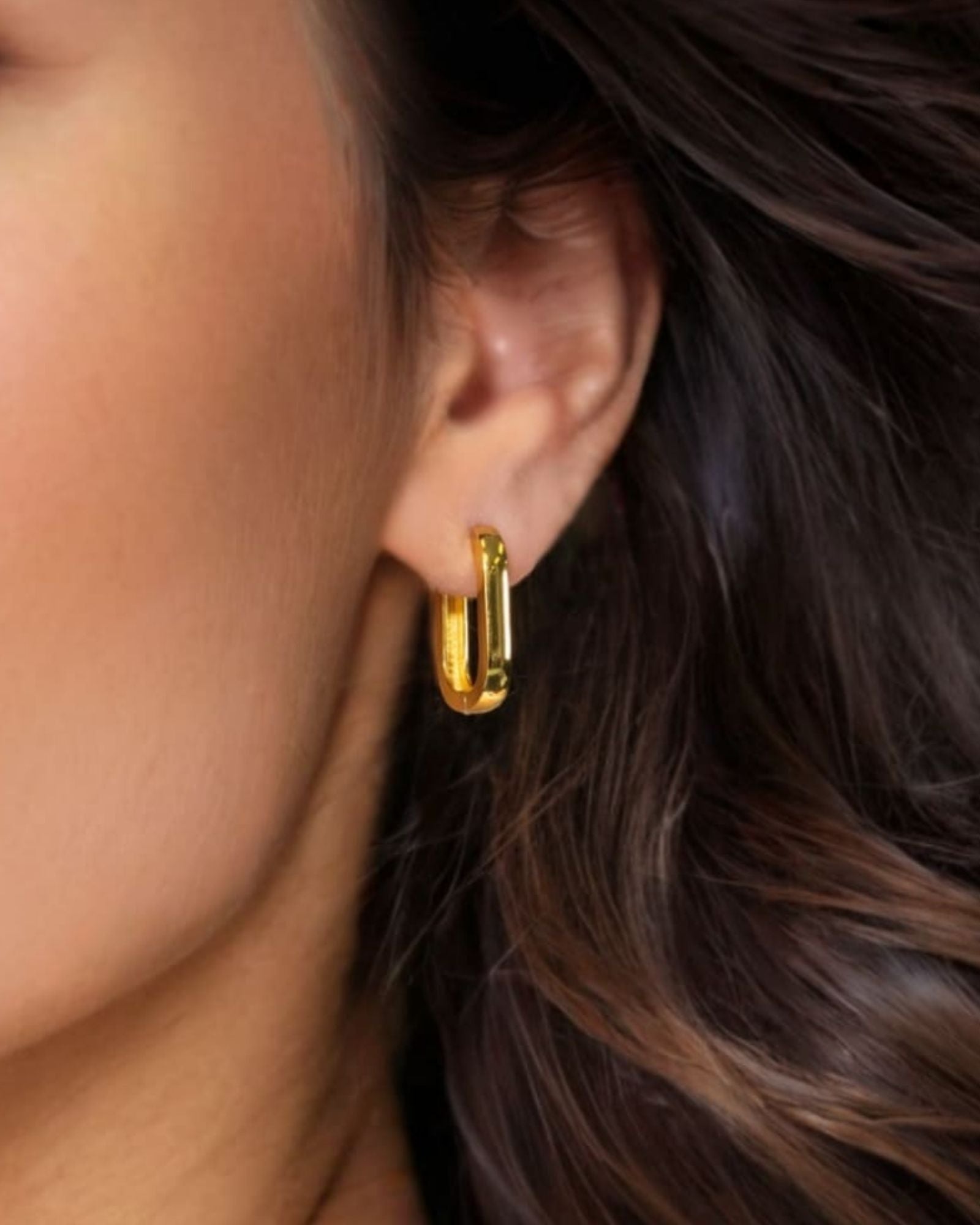 Ellipse Gold Hoop Earrings by Lavana on model slim oblong hinged hoops