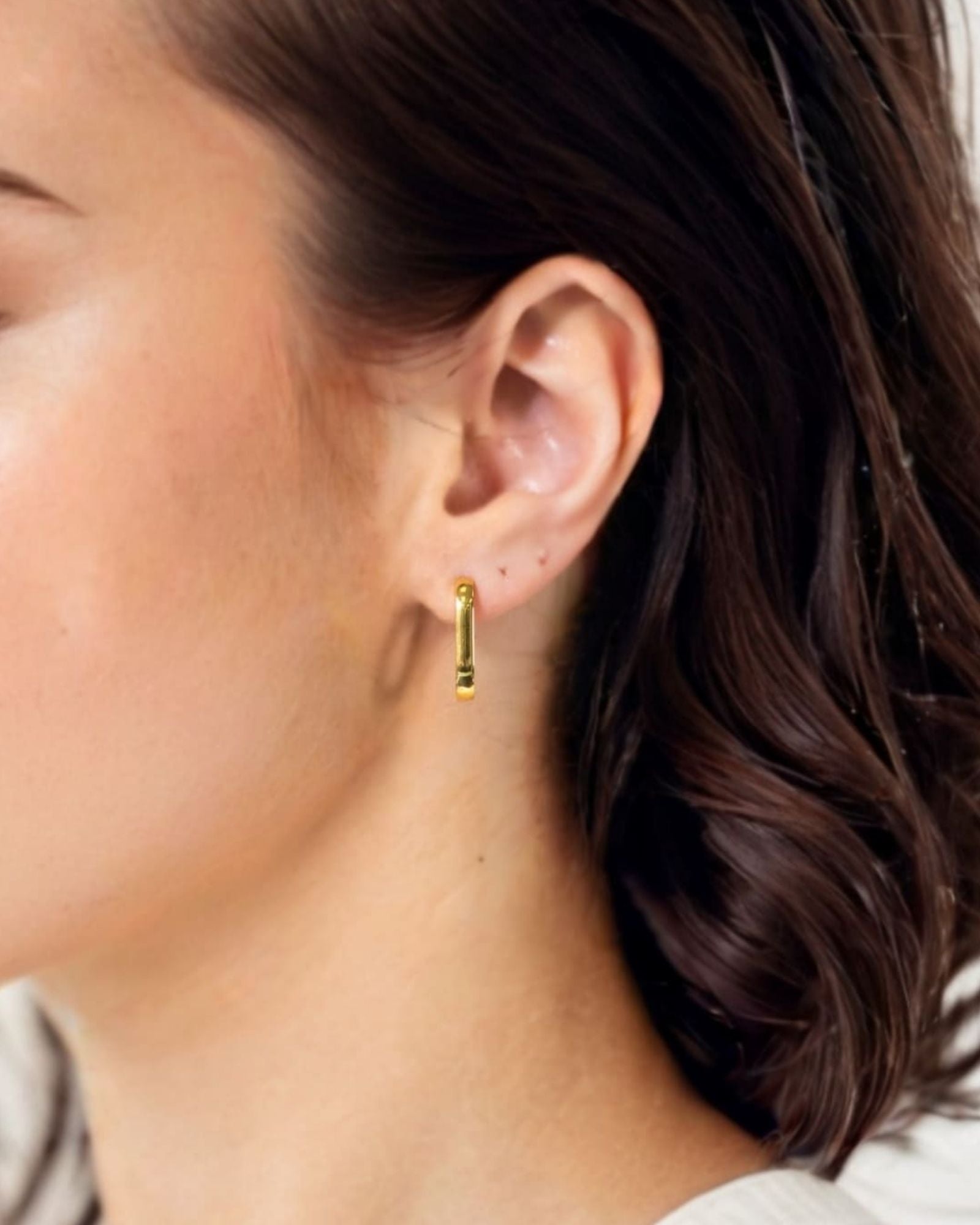 Ellipse Gold Hoop Earrings by Lavana on model slim oblong hinged hoops