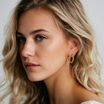 Entwine Gold Hoop Earrings by Lavana on model open hoop with twisted rope detail