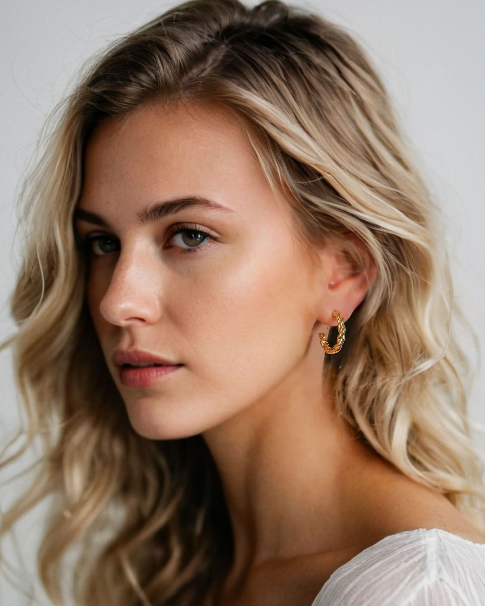 Entwine Gold Hoop Earrings by Lavana on model open hoop with twisted rope detail