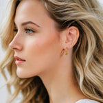 Entwine Gold Hoop Earrings by Lavana on model open hoop with twisted rope detail