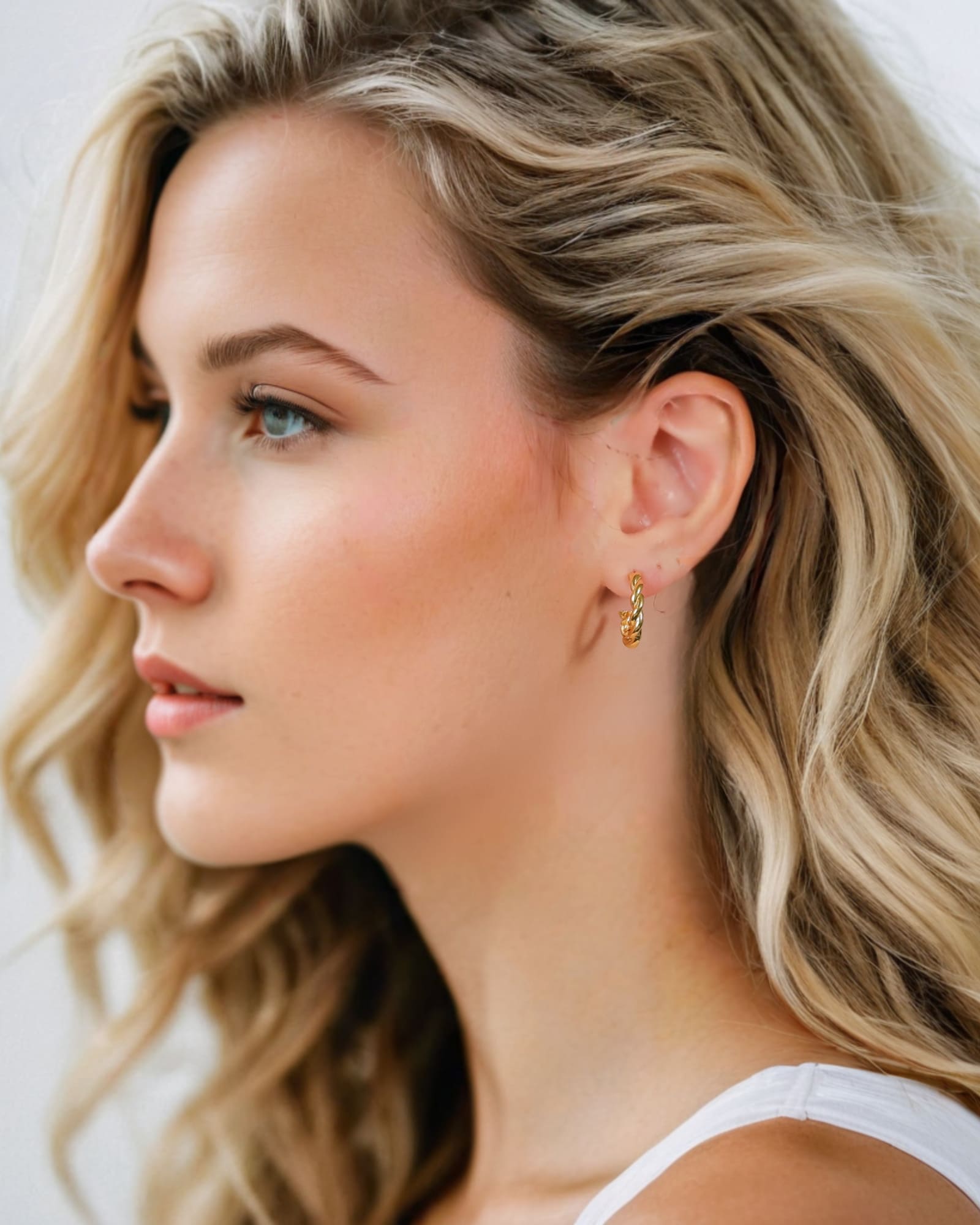 Entwine Gold Hoop Earrings by Lavana on model open hoop with twisted rope detail